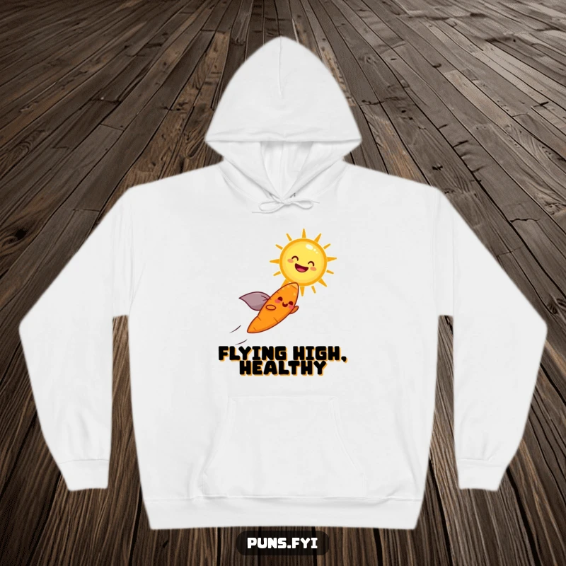 Funny hoodie featuring a cheerful carrot with a cape flying towards a laughing sun, symbolizing joy and adventure.
