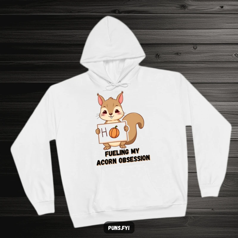 Funny squirrel hoodie with a playful squirrel holding a sign with a drawing of a nut, offering warm, nutty comfort.