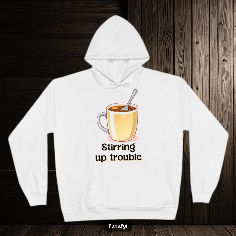 Funny hoodie with a tiny spoon bravely stirring a huge mug of sparkling liquid, representing determination and humor.