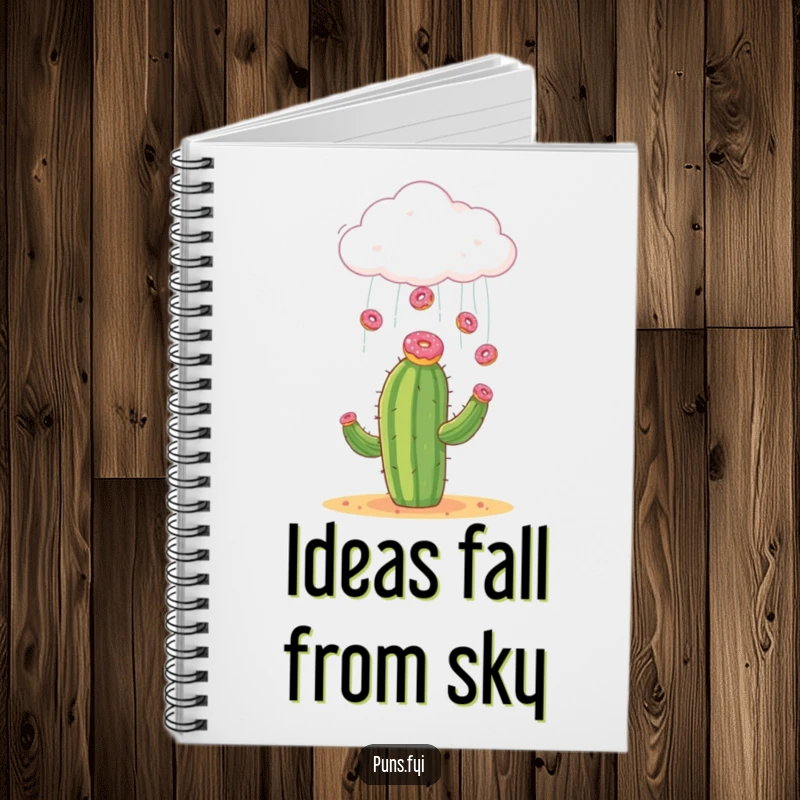 Funny notebook cover featuring a cloud raining donuts onto a surprised cactus, a delightful way to write down ideas.